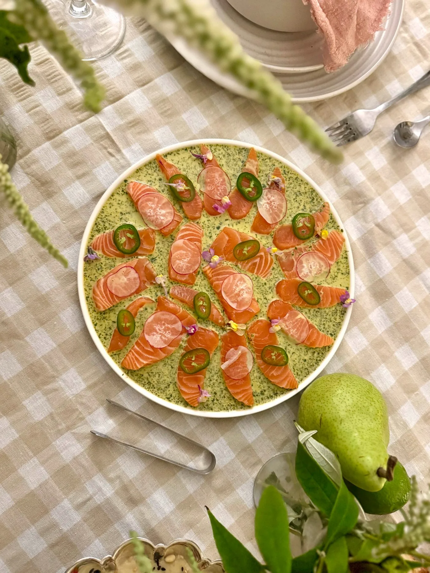 Salmon crudo in green herb sauce with jalapeño