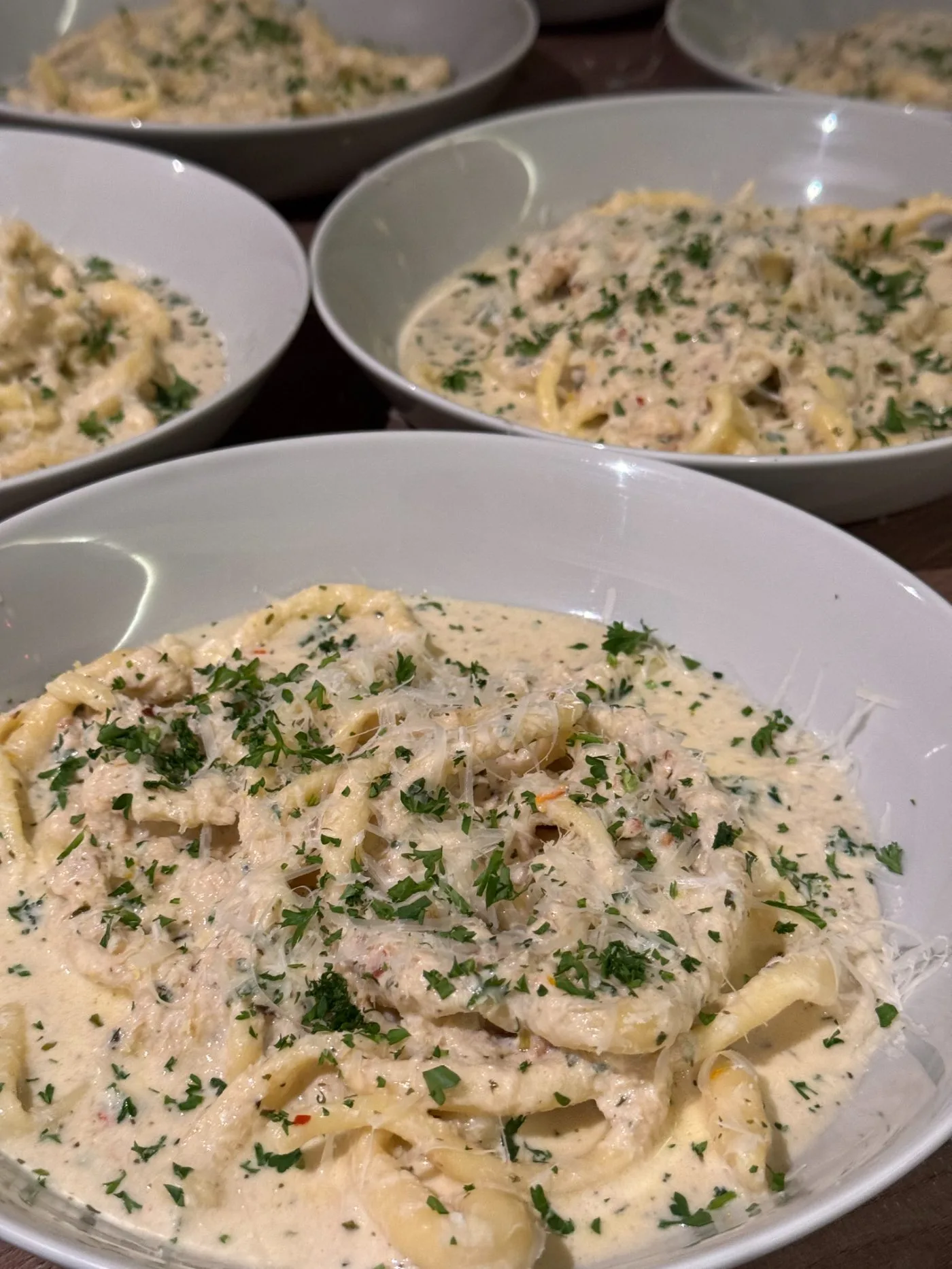 Hand-rolled pasta in creamy parmesan sauce