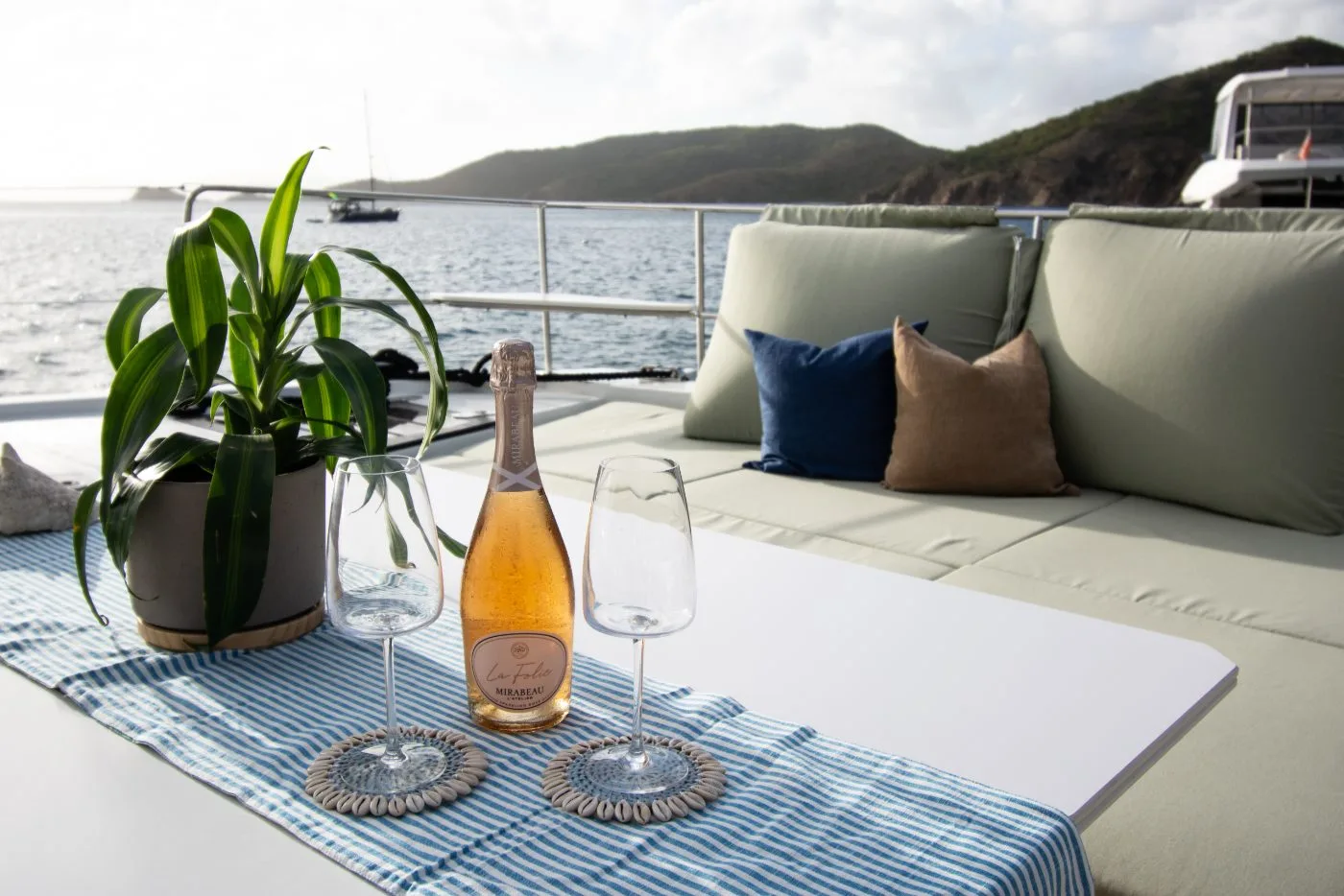Sparkling rosé on Allegra's deck at golden hour