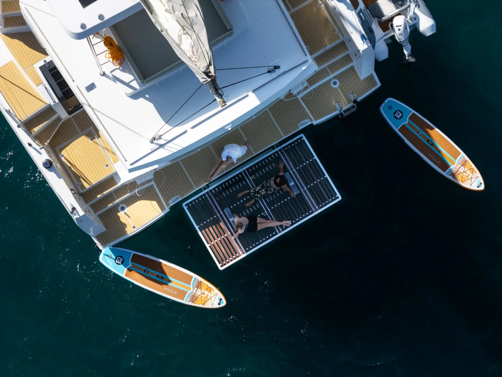 Allegra from above, at anchor with paddleboards and swim platform