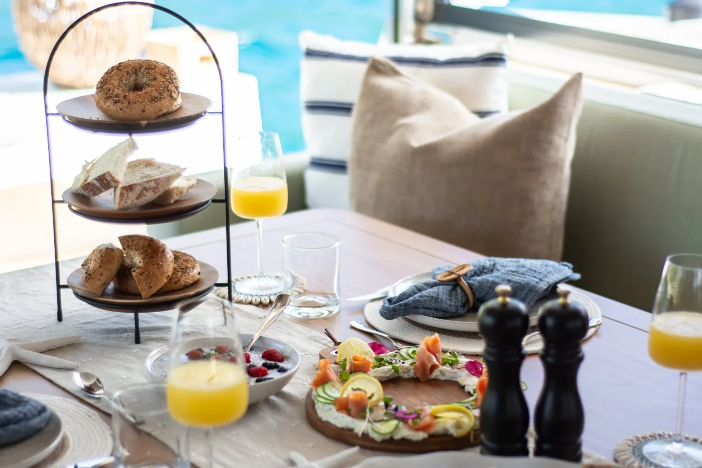 Lunch spread aboard Allegra — bagels, smoked salmon platter, mimosas